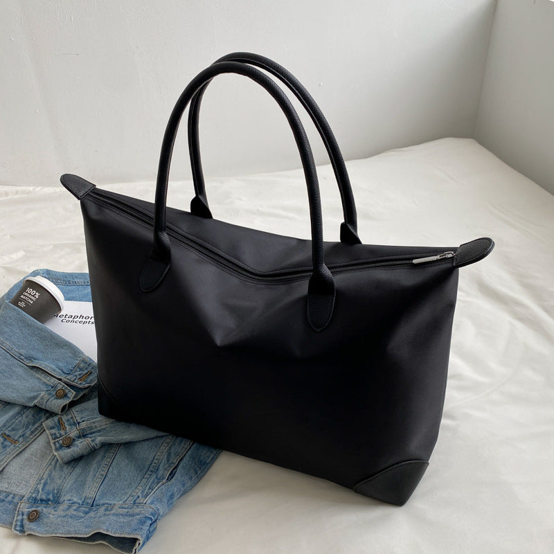 Large travel bag with durable material and multiple compartments Stornfield