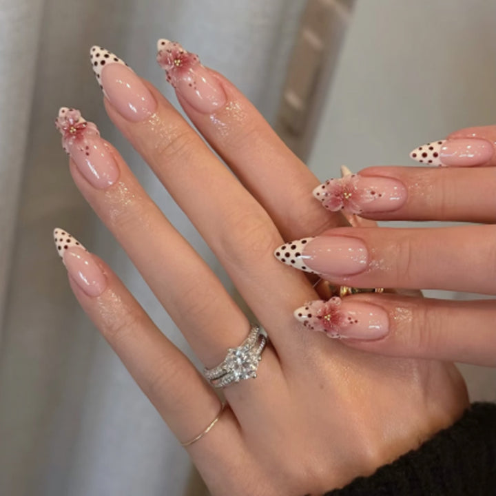 Artificial nail art with floral accents Stornfield