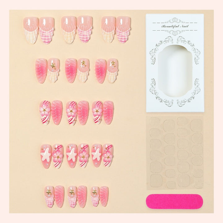 Artificial nail set with maritime motifs and glamorous accents Stornfield