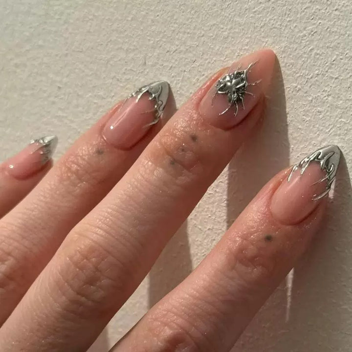 Creative Nail Art with Stylish Metallic Finish Stornfield
