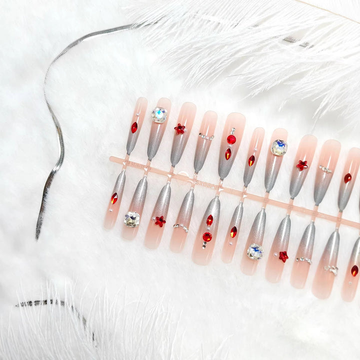 Artificial nails with glamorous design and sparkling accents Stornfield