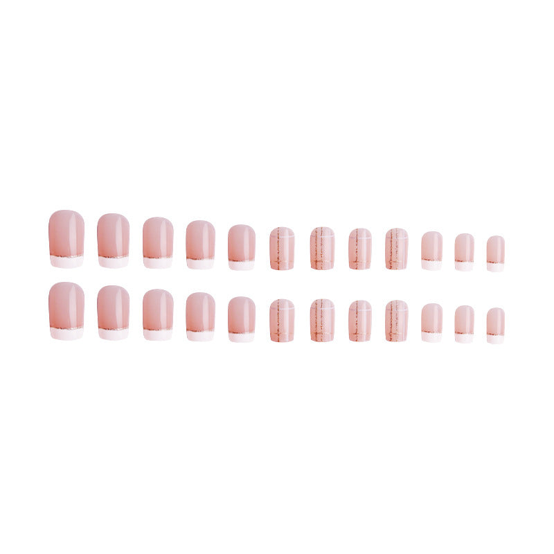Nail set with elegant French tip and fashionable embellishments Stornfield