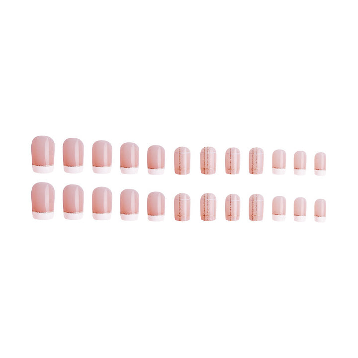 Nail set with elegant French tip and fashionable embellishments Stornfield
