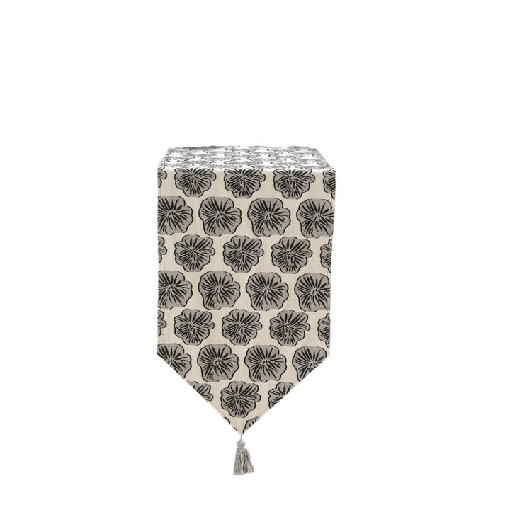 Elegant linen table runner with tassels and decorative print