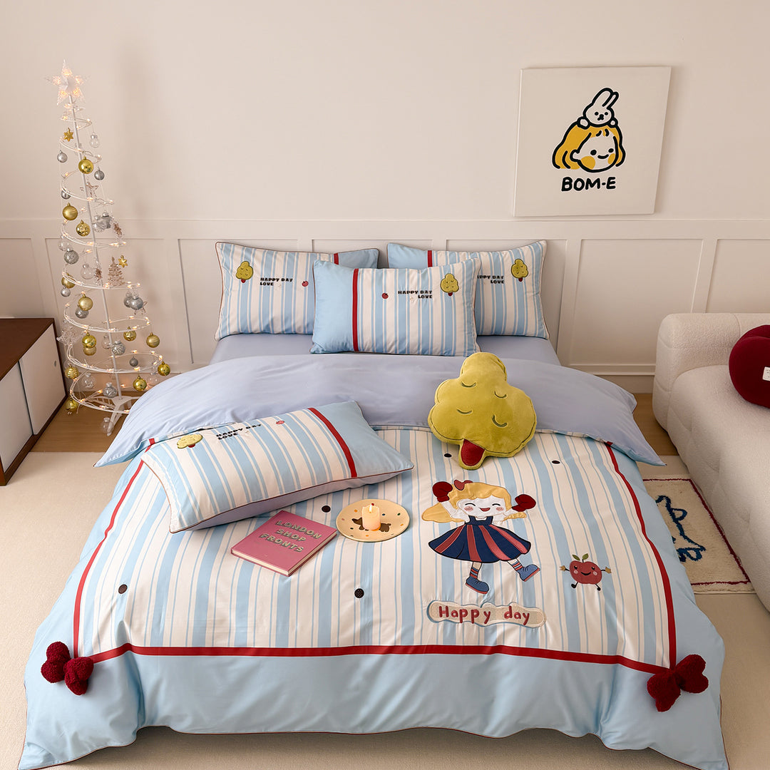 Children's bedding set with embroidered comic design and striped details