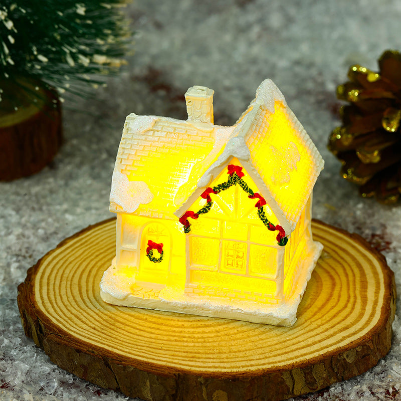 Illuminated Christmas village house with festive decoration Stornfield