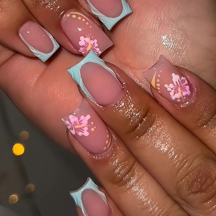 Artificial nail set with floral motifs and shiny accents Stornfield