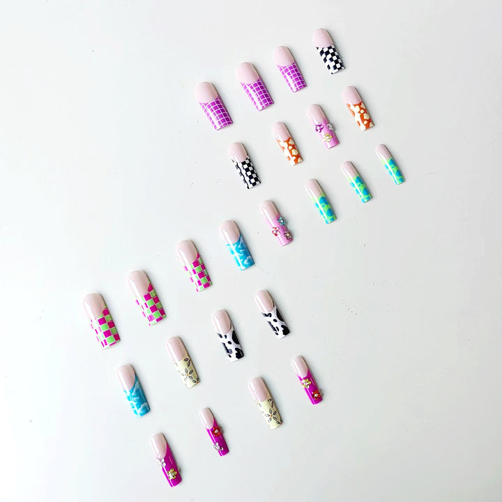 Nail art set with creative designs and shimmering accents Stornfield