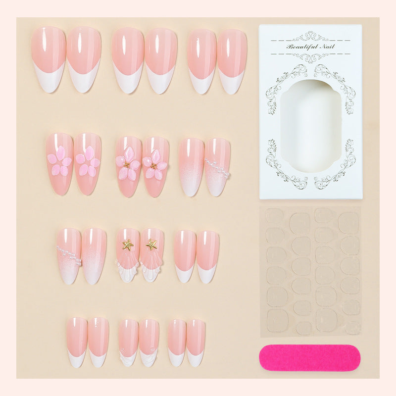 Artifical nail set with delicate flower and decorative elements Stornfield