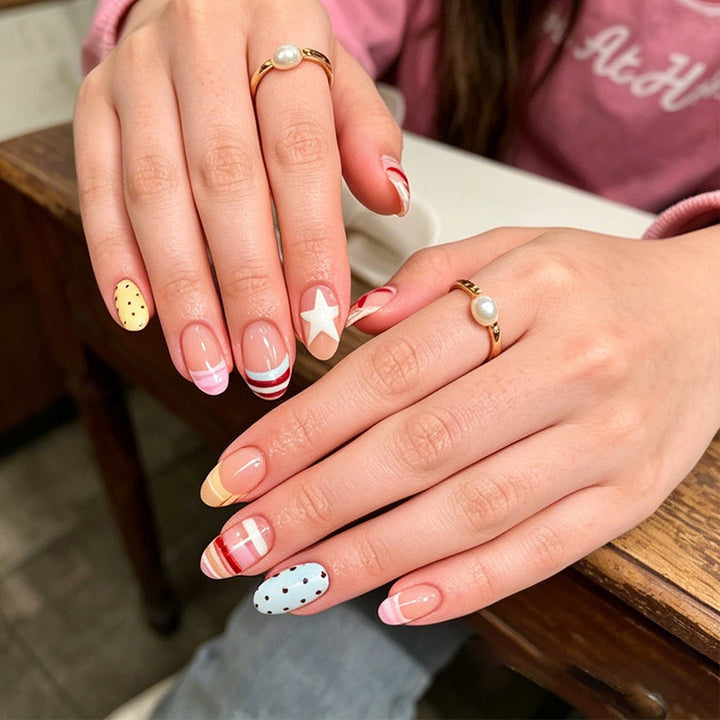 Artificial nail set with cheerful patterns Stornfield