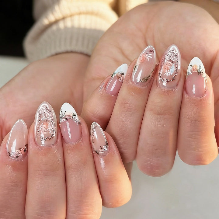 Acrylic nail set with elegant floral and glitter motifs Stornfield