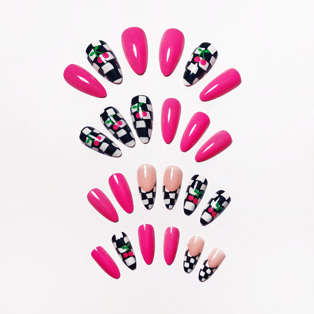 Creative artificial nails with playful cherry and checkerboard design Stornfield