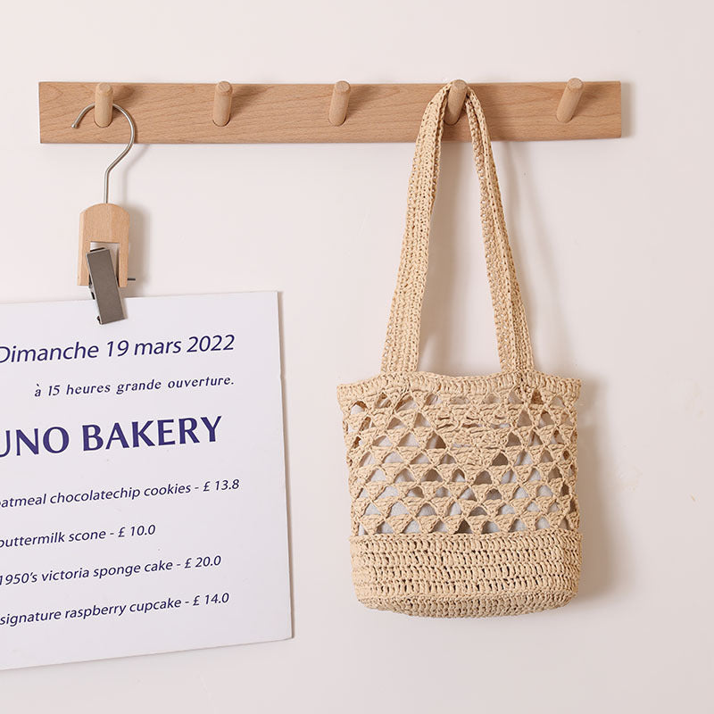 Handcrafted net straw bag with elegant straps Stornfield