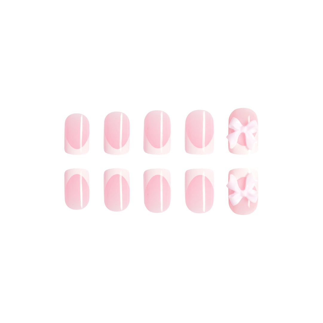 Artificial nails with cute bow designs Stornfield