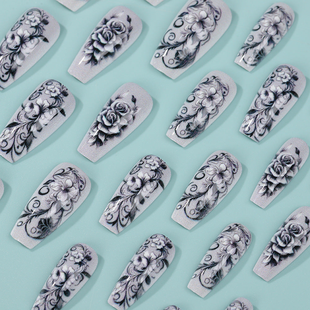 Artificial nails with floral designs Stornfield