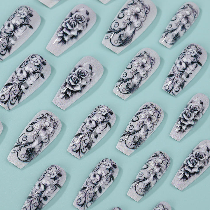 Artificial nails with floral designs Stornfield