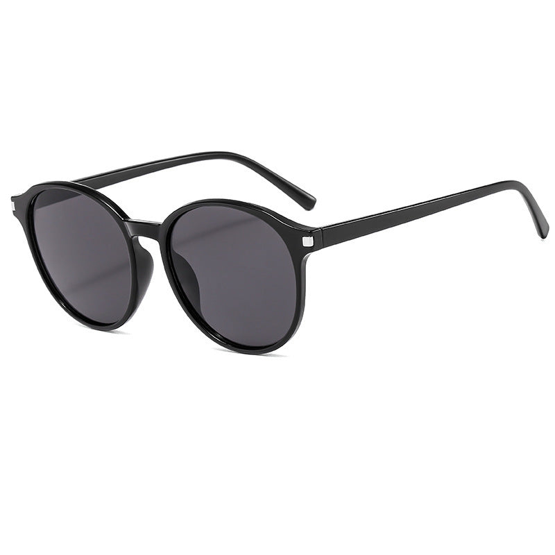 Women's retro-inspired sunglasses with curved frames and UV protection Stornfield