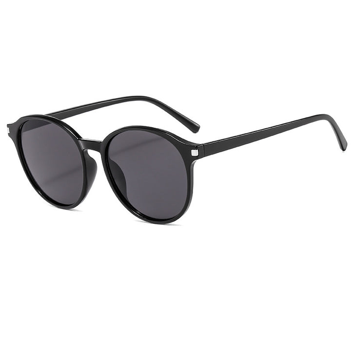 Women's retro-inspired sunglasses with curved frames and UV protection Stornfield