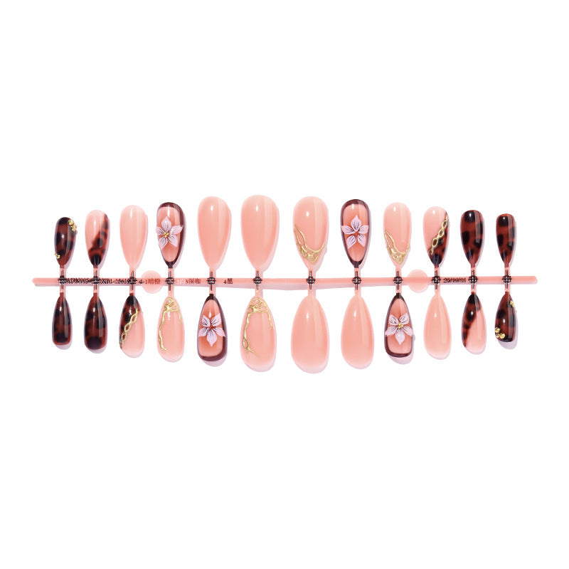 Artistic Press-On Nail Set with Elegant Floral and Abstract Designs Stornfield