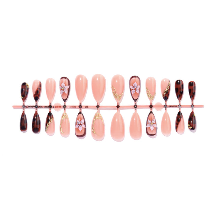 Artistic Press-On Nail Set with Elegant Floral and Abstract Designs Stornfield