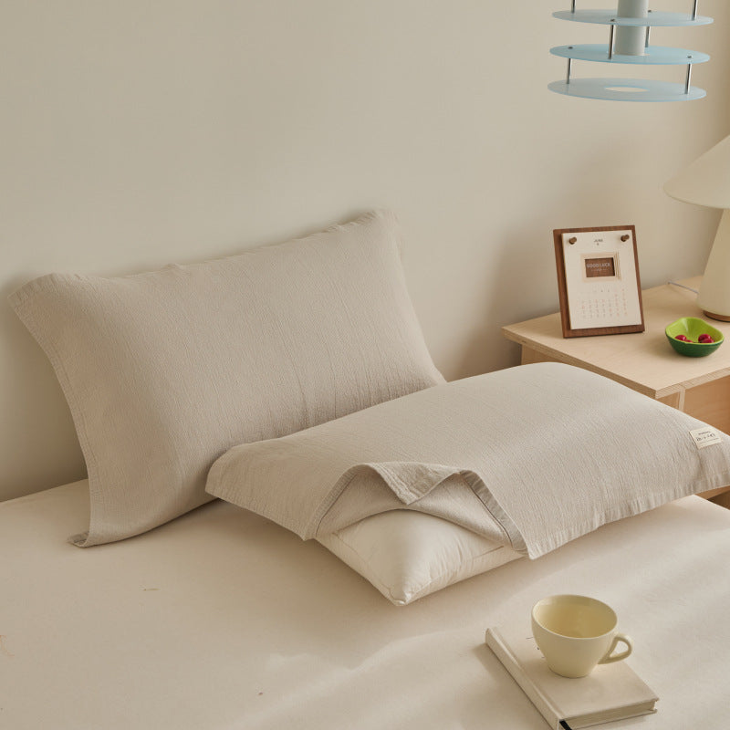 Textured cushion cover set made of cotton-linen blend with waffle structure