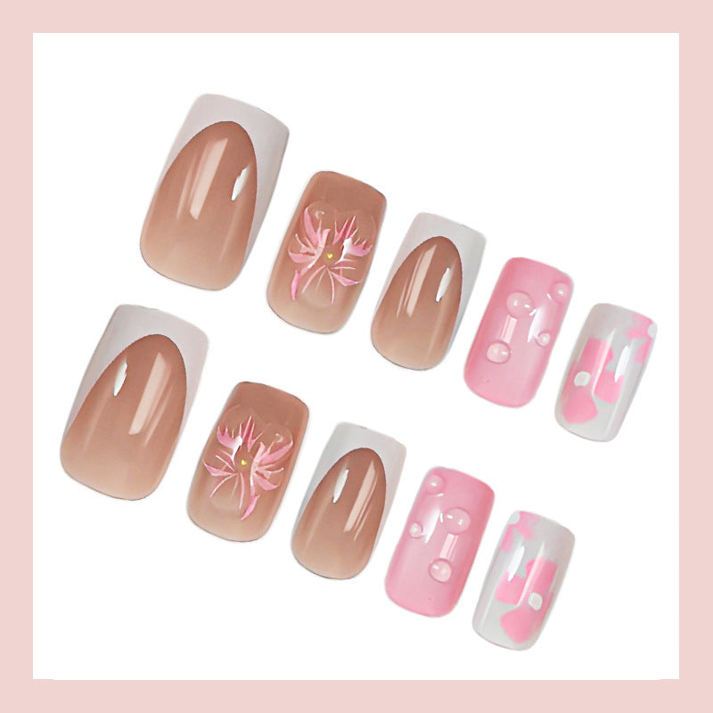Acrylic nail set with floral and glamorous design Stornfield