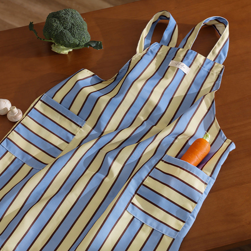 Bib apron with crossed straps and large front pockets Stornfield