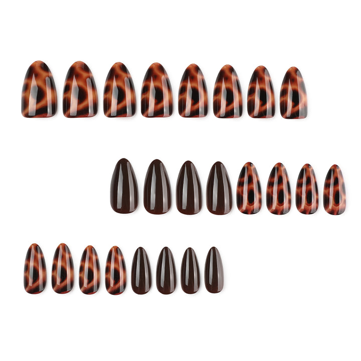 Artful stiletto nails with elegant leopard pattern Stornfield