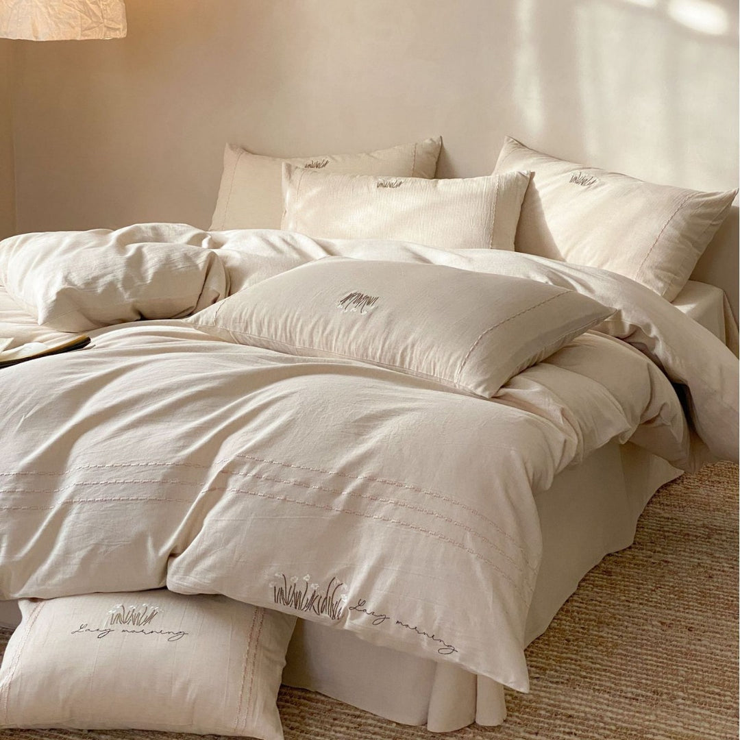 Stonewashed Organic Cotton Duvet Cover Set with Embroidered Pillow Shams and Pintuck Detail