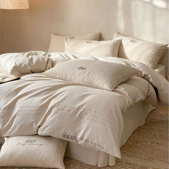 Stonewashed Organic Cotton Duvet Cover Set with Embroidered Pillow Shams and Pintuck Detail
