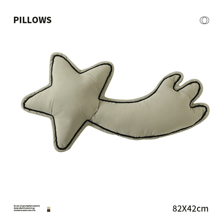 Decorative star cuddle pillow with tail and quilted piping