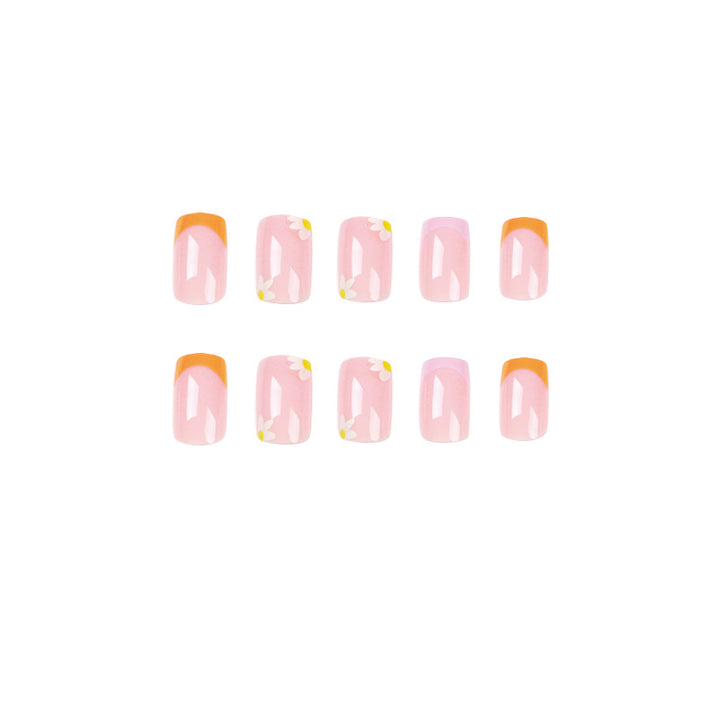 Artistic acrylic nails with floral design and creative color accents Stornfield