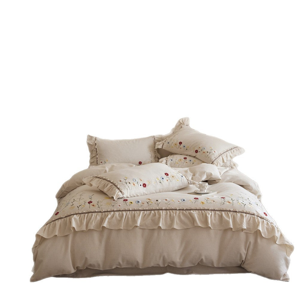 Bedding set made of cotton-linen with floral embroidery and ruffle edge