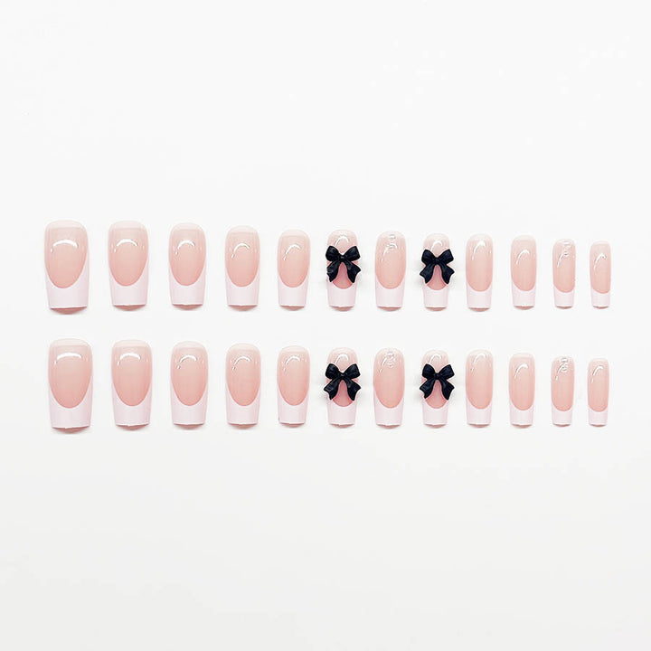 Acrylic nail set with stylish black and pearl details Stornfield