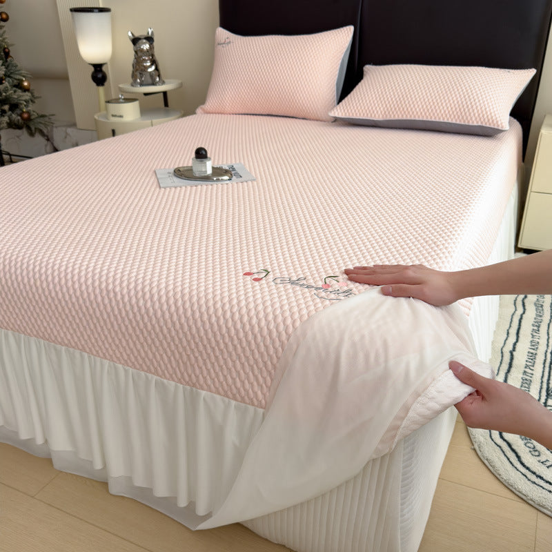 Quilted mattress protector with elastic all-around fit and panda embroidery