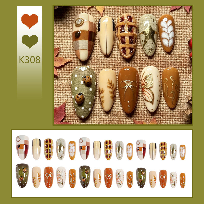 Artificial nail set with handcrafted botanical patterns and elegant accents Stornfield
