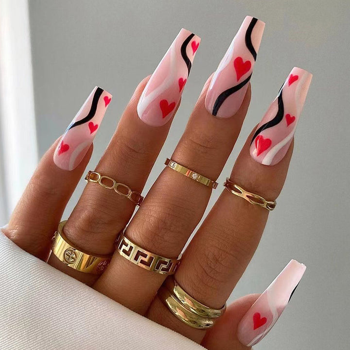 Artificial nail extensions with heart design Stornfield