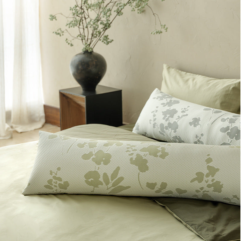 Extra-long comfort lumbar pillow with breathable jacquard cover
