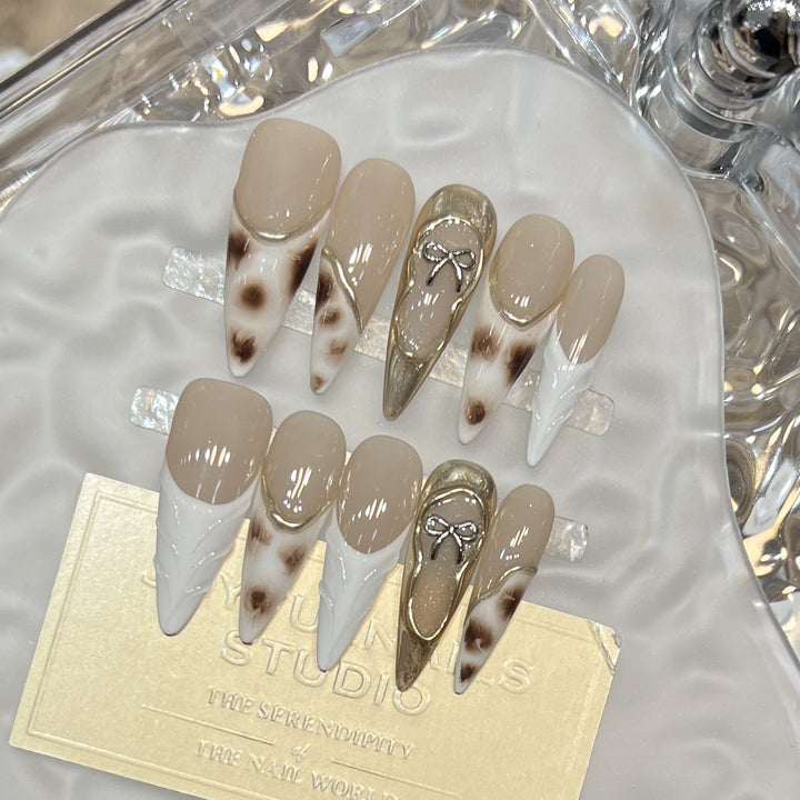 Decorative Stiletto Press-On Nail Art Set with Unique Design Elements Stornfield
