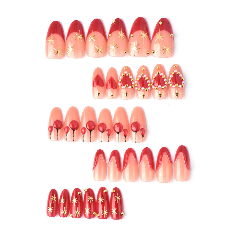 Elegant artificial nails with romantic gold and pearl embellishments Stornfield