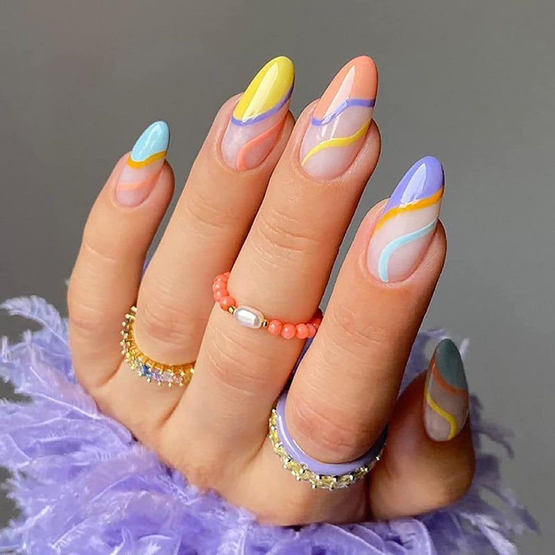Artificial nail extensions with stylish gradient colors and modern designs Stornfield