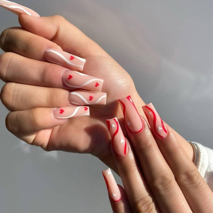 Artificial nail art with hearts Stornfield