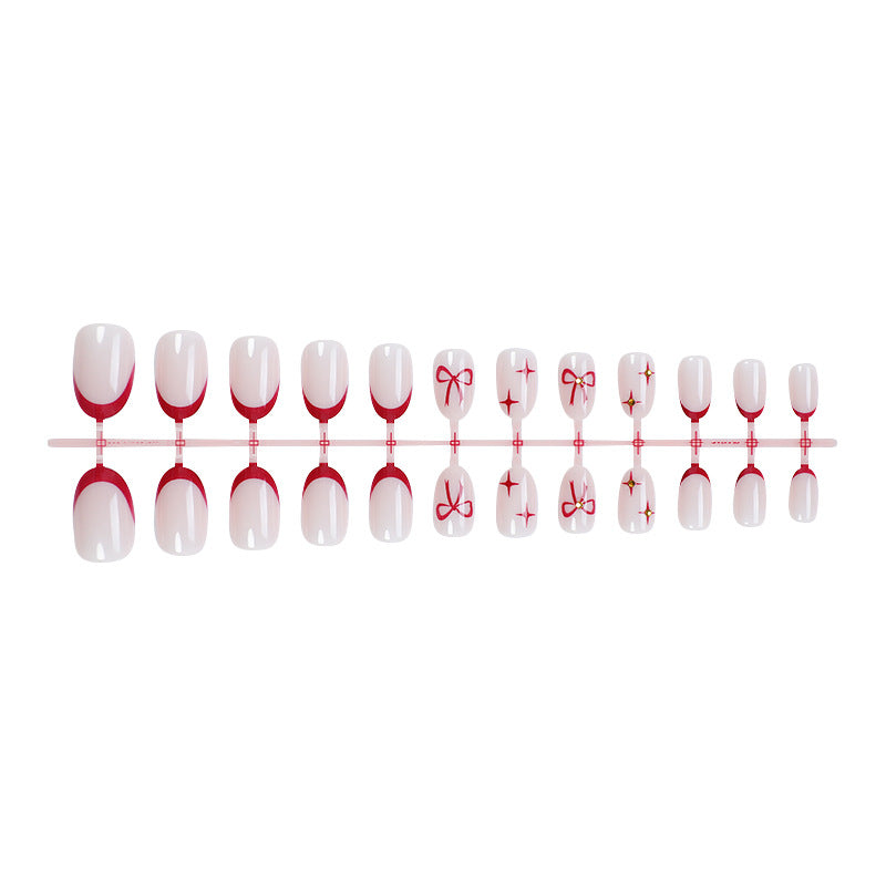 Acrylic nail set with elegant arch design and glitter effects Stornfield