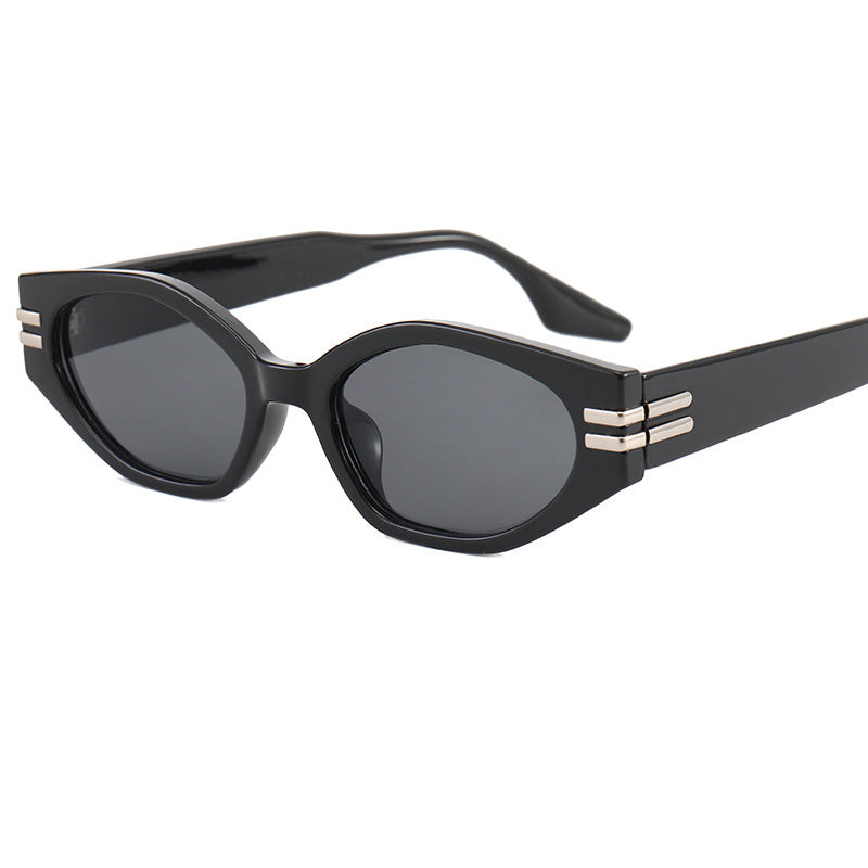 Women striking vintage sunglasses with asymmetric frame Stornfield
