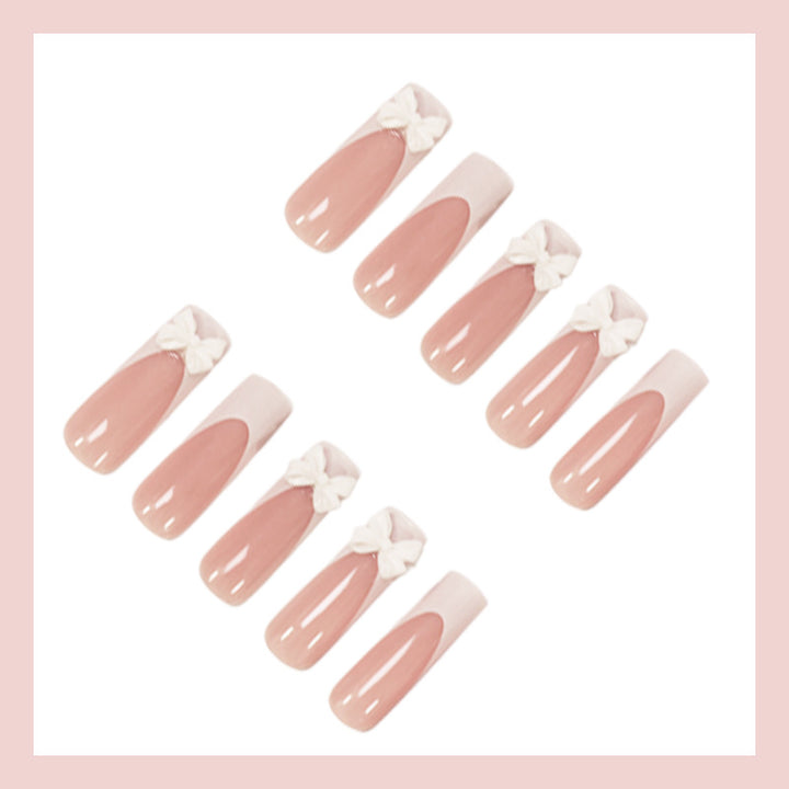 Artificial nail set with shimmering details and cute bows Stornfield