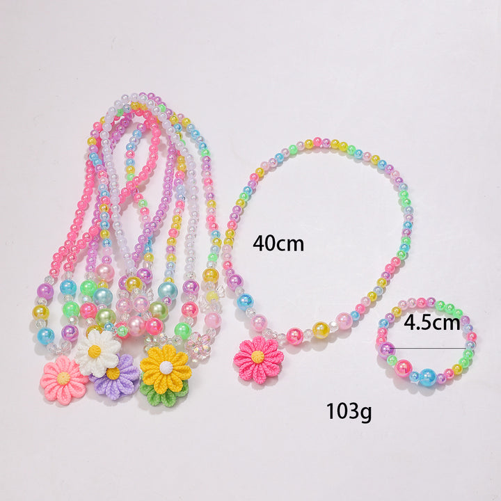 Playful jewelry set with flower pendant Stornfield