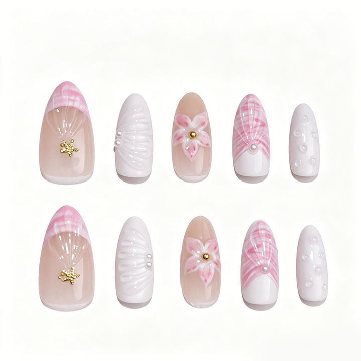 Art nail set with elegant floral decorations and glitter accents Stornfield