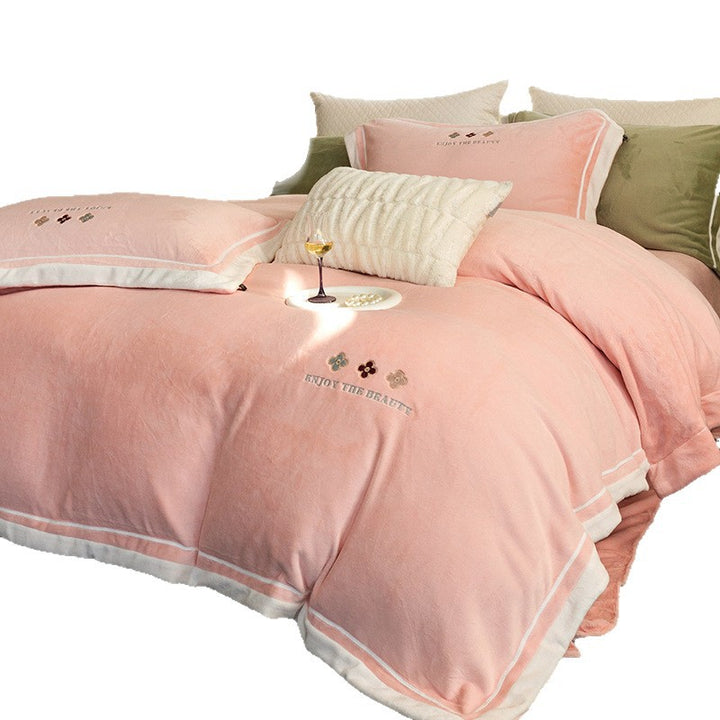 Velvety duvet cover set with embroidered floral design and contrasting piping