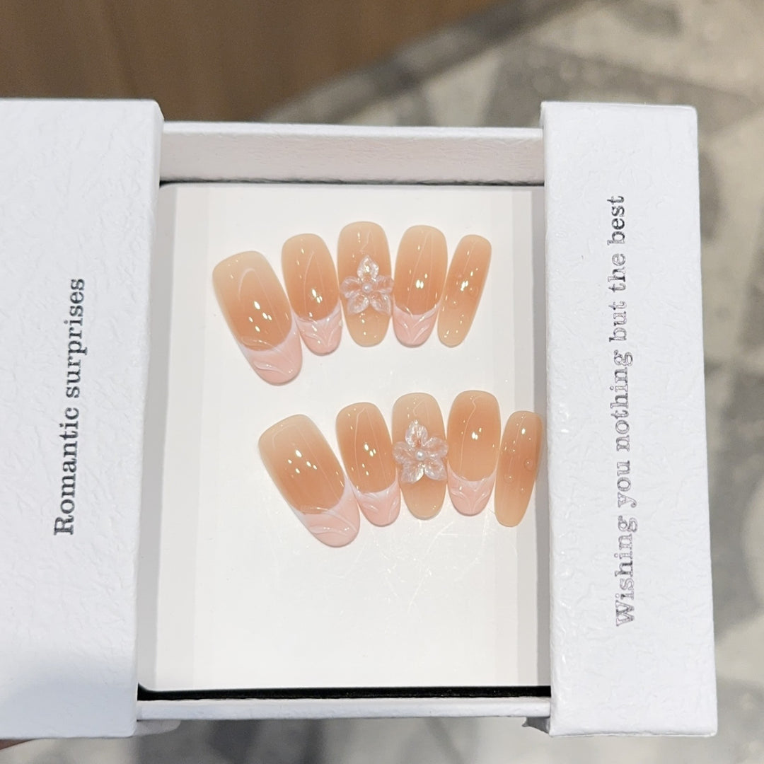 Artificial nails with romantic 3D flower accents Stornfield