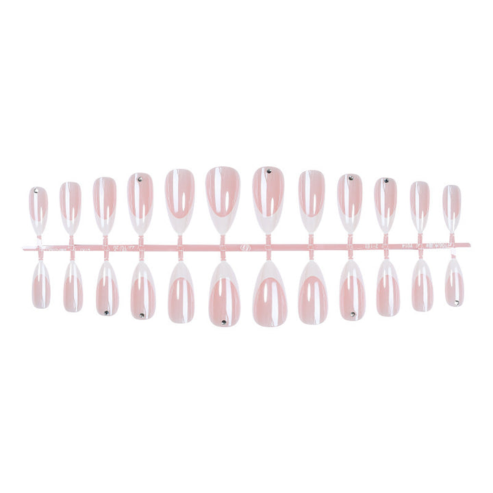 Artificial nail set with elegant French tips and glitter accents Stornfield